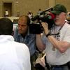 Talking to evacuees in the New Orleans Convention Center following Katrina.